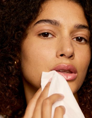 Clear skin and healthy model using our skincare 100% premium cotton towelette