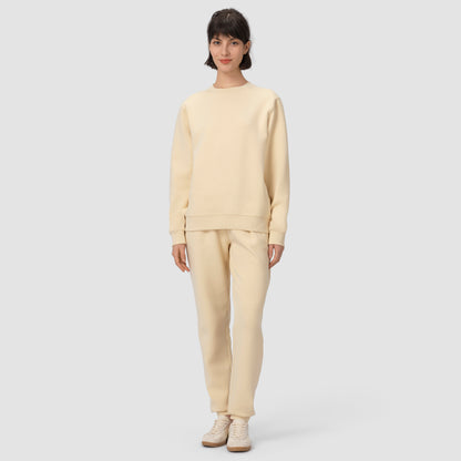 Full feet model wearing cream loungewear set in plain background