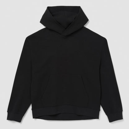 Sweat à capuche noir sur fond gris clair