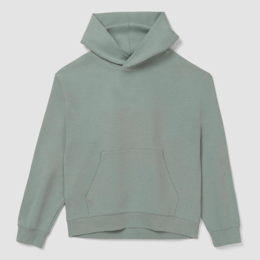 Sweat à capuche vert sur fond gris clair
