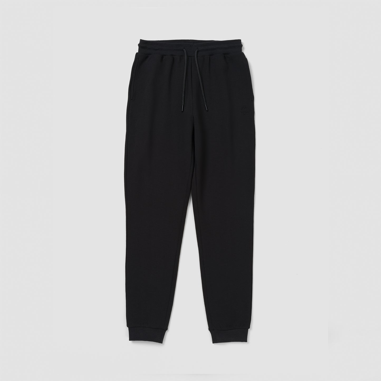 Black sweatpants on a light gray background