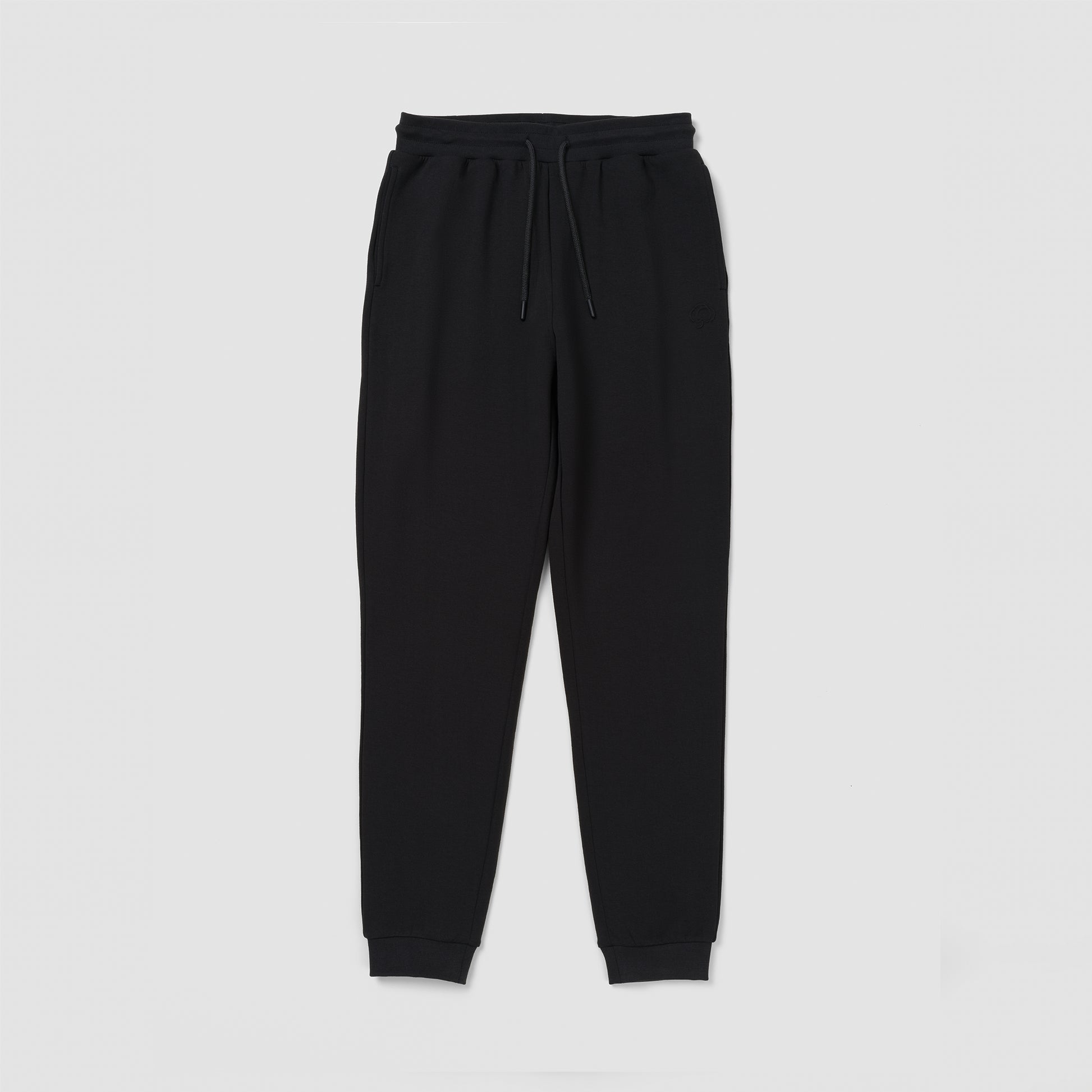 Black sweatpants on a light gray background