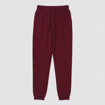 Burgundy jogger on a white background