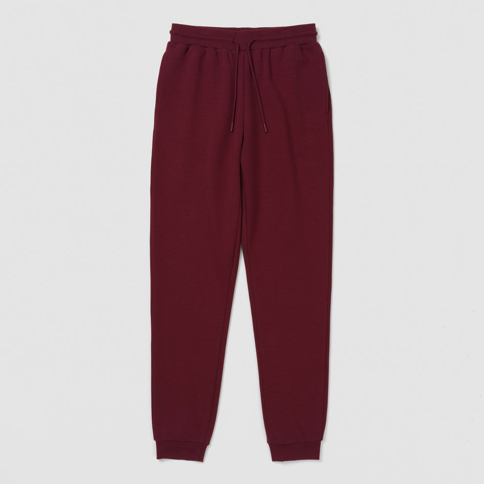 Pantalon de jogging bordeaux sur fond blanc