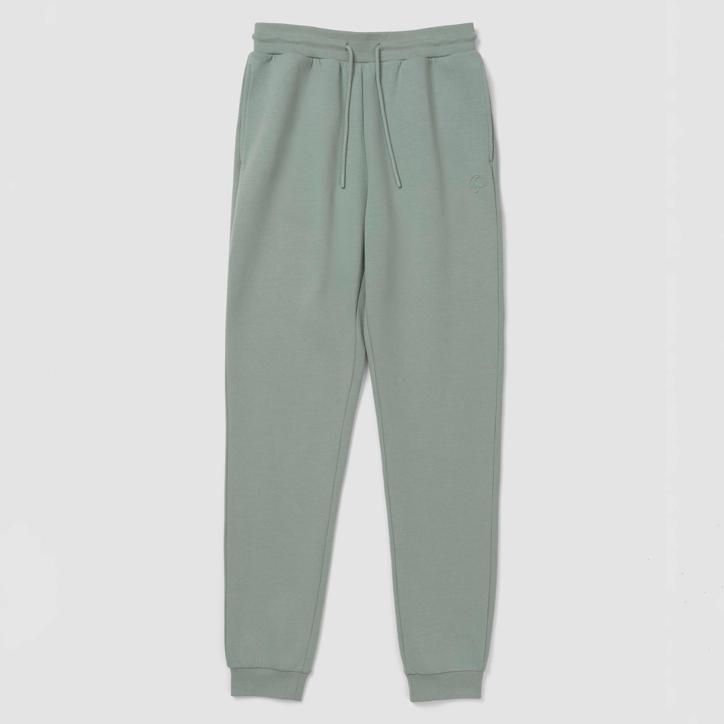 Jogger vert sauge clair sur fond blanc