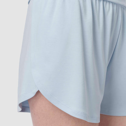 Close up of pajama short light blue in a plain background