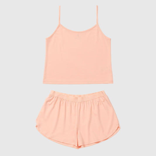 Ensemble caraco et short couleur saumon sur fond gris clair