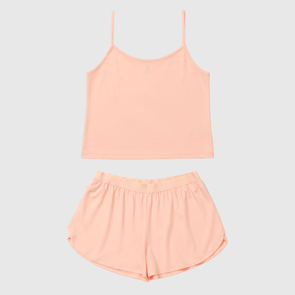 Ensemble caraco et short couleur saumon sur fond gris clair