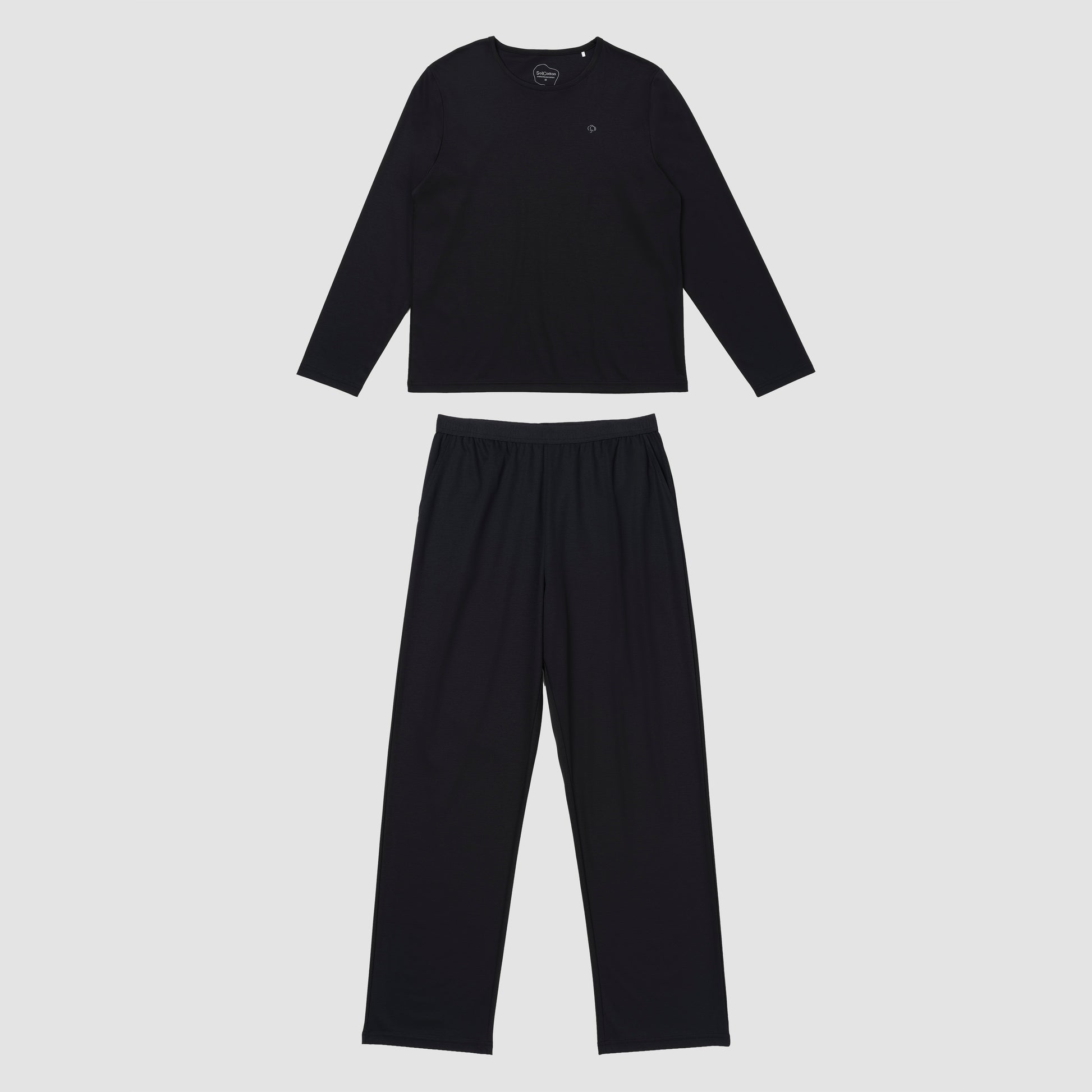 Black pajama set on grey background