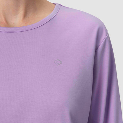 Close up of long sleeve lavender pajama set with silver logo