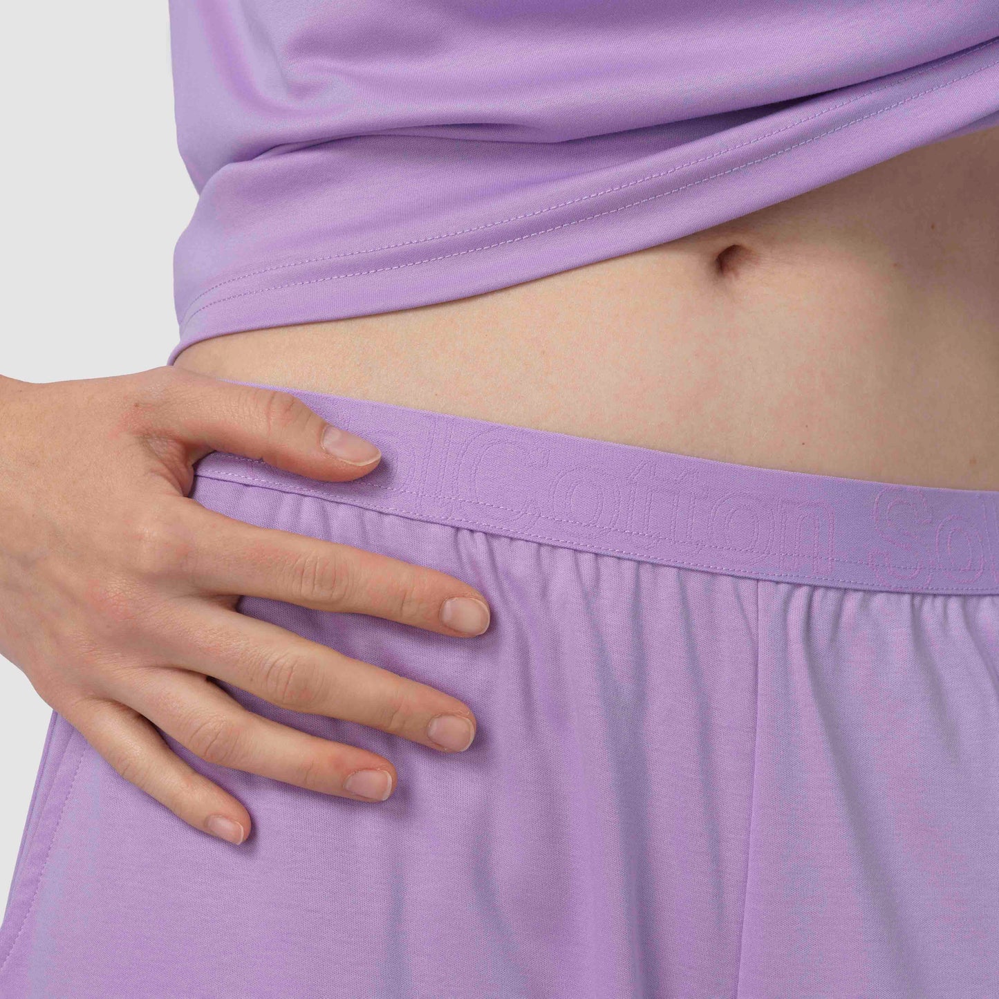 Close up of lavender pajama set with belt