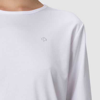 Colse up of long sleeve top pajama with silver logo