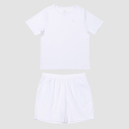 White t-shirt and shorts set on a light gray background