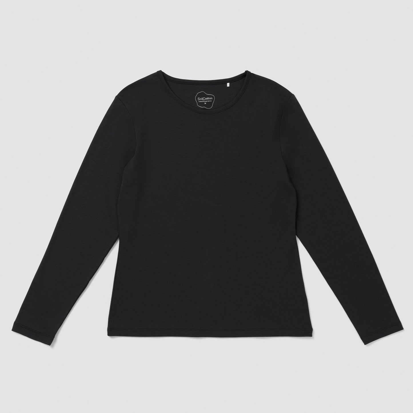Black long-sleeve shirt on a light gray background