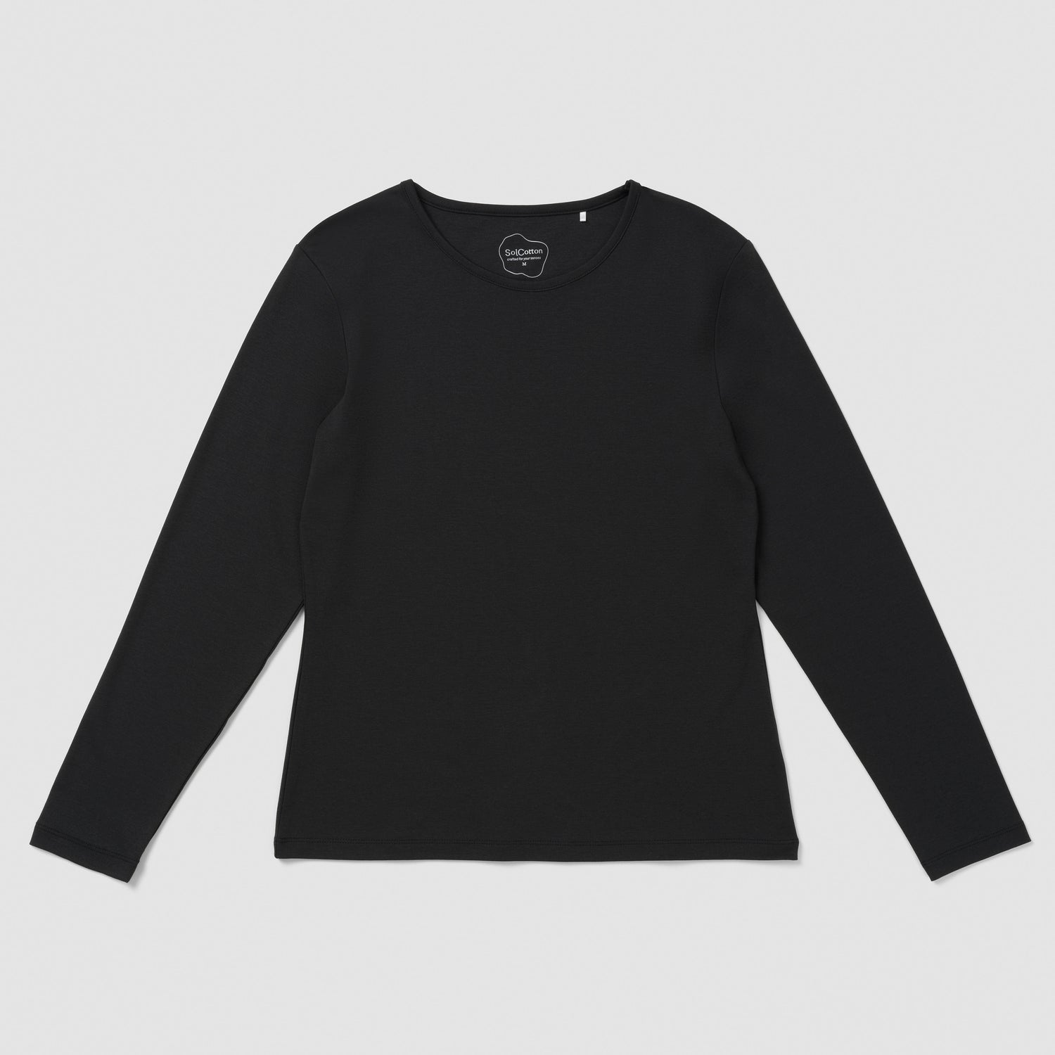 Black long-sleeve shirt on a light gray background