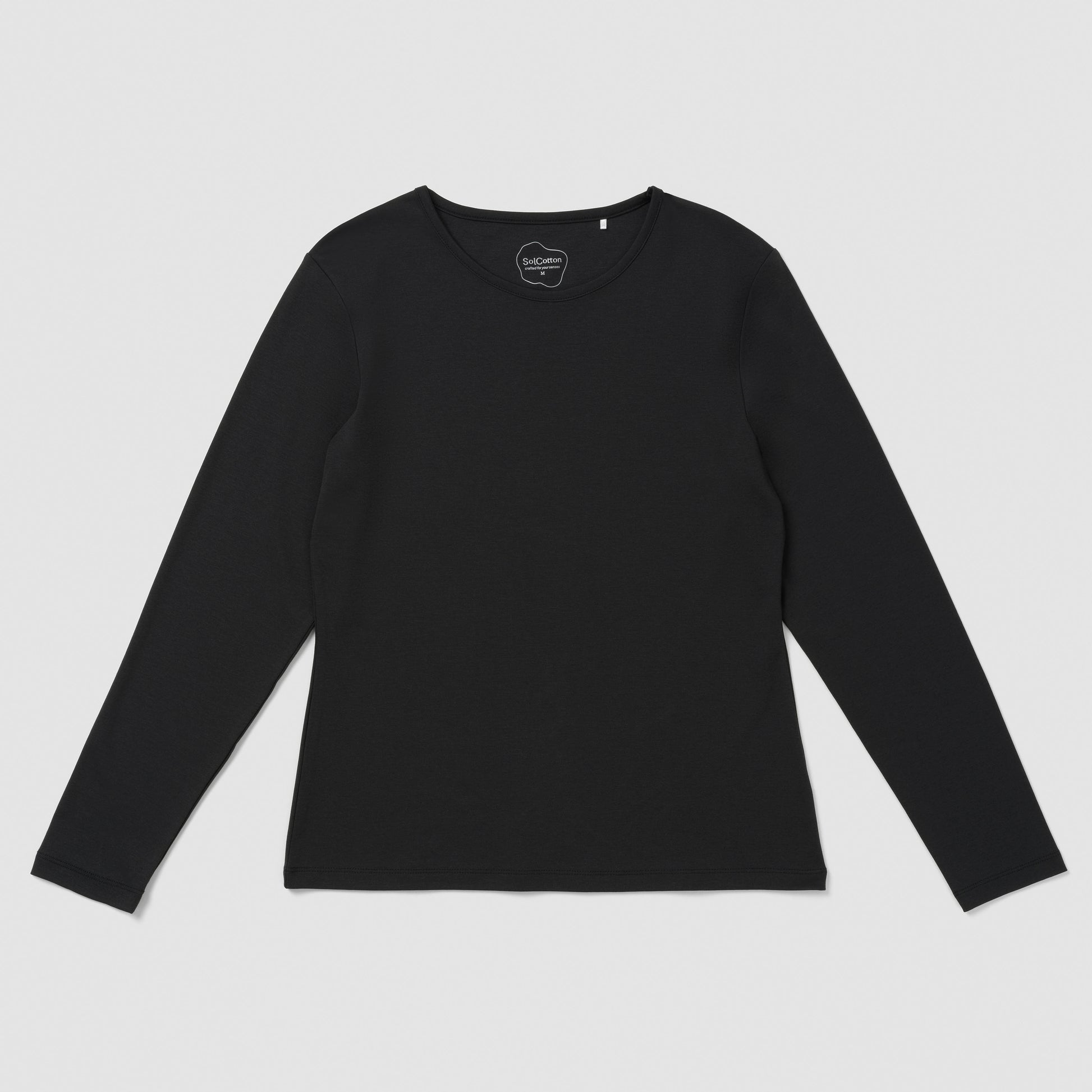 Black long-sleeve shirt on a light gray background
