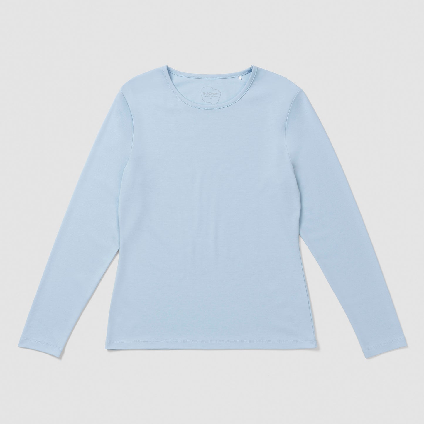 Light blue long-sleeve shirt on a light gray background