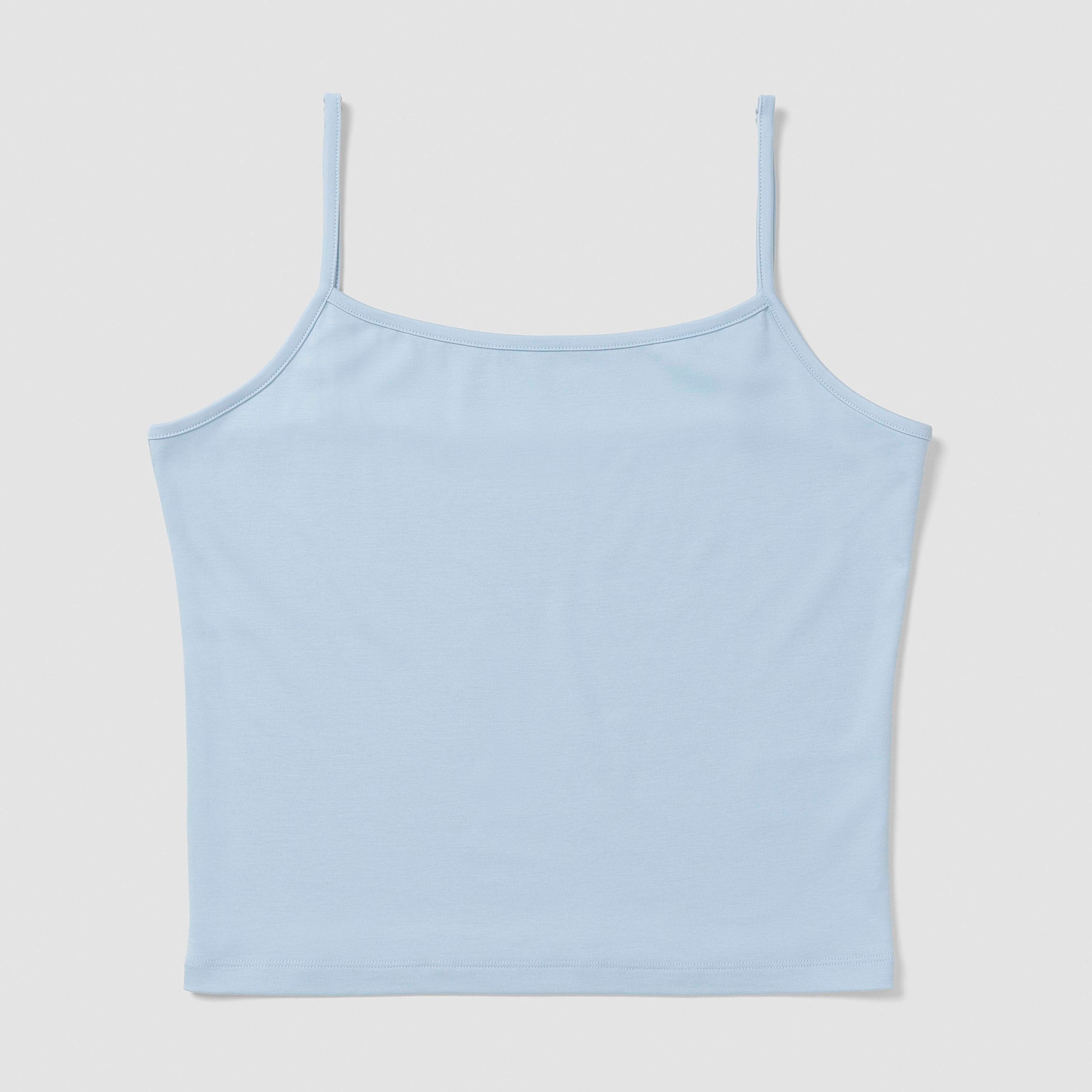 Light blue camisole on a light gray background