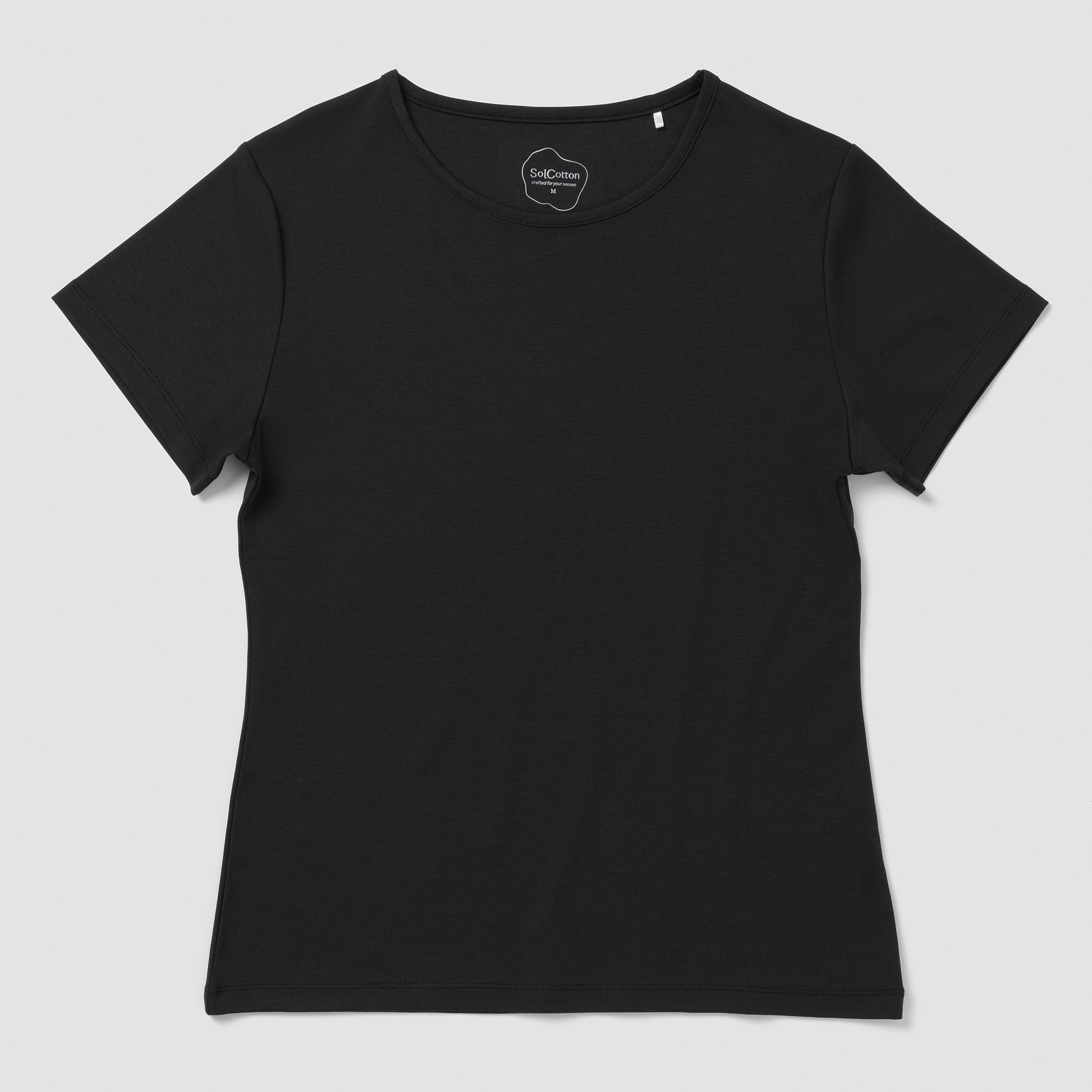 Black t-shirt on a light gray background