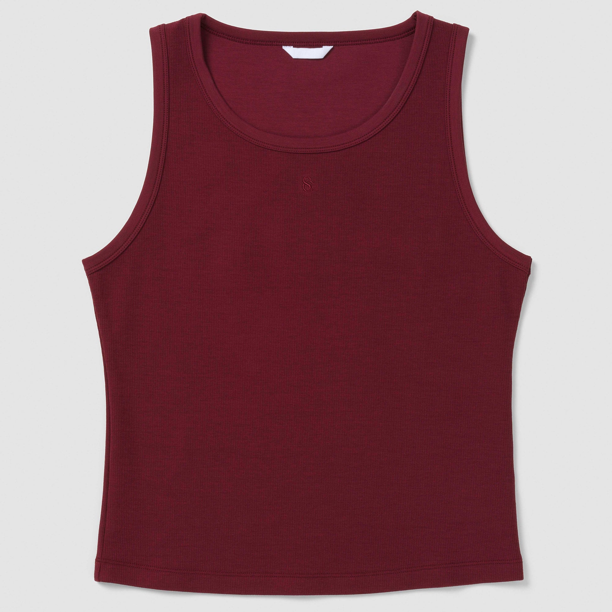 Burgundy tank top on a light gray background