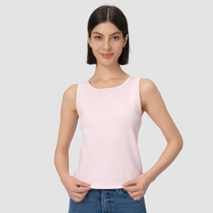Woman wearing light pink tank top a bit closer