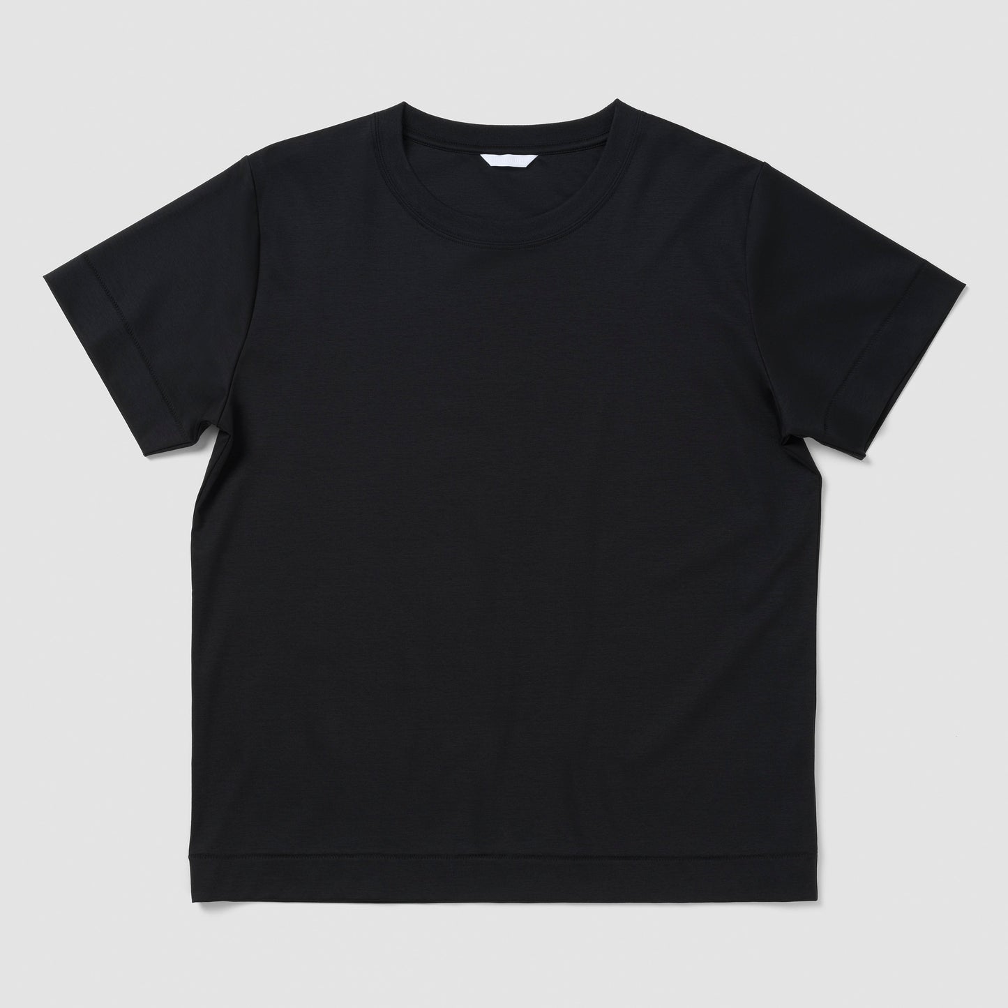 Black t-shirt on a light gray background
