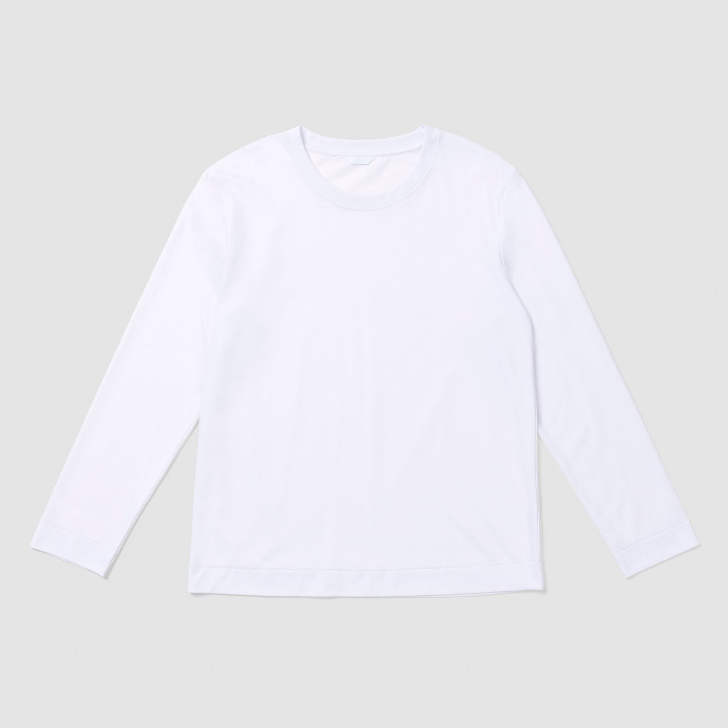 White long-sleeve shirt on a light gray background