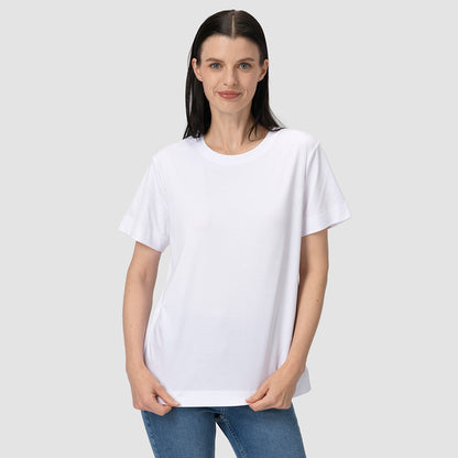 Woman wearing a plain white t-shirt and blue jeans on a light gray background